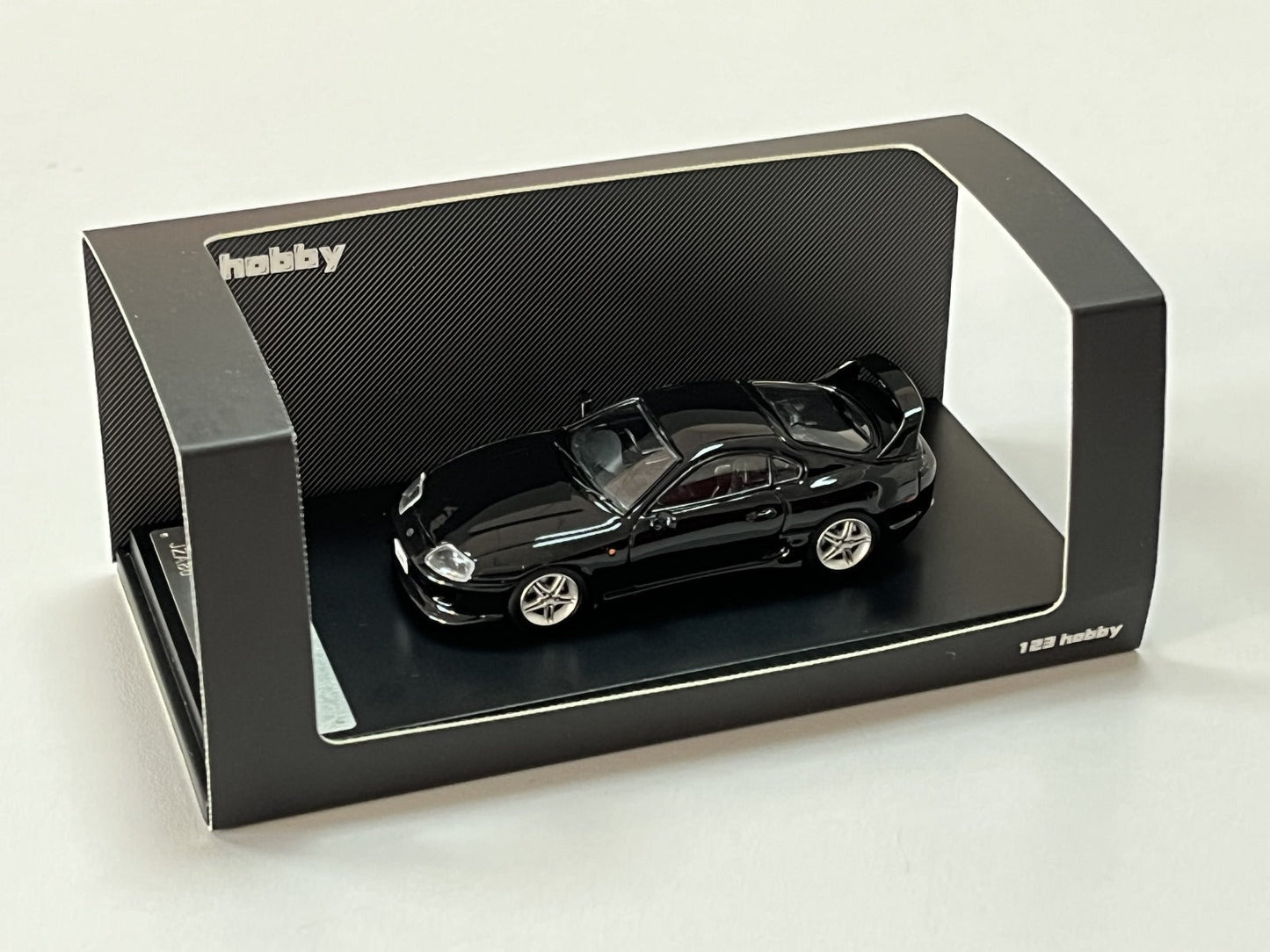 123 Hobby Toyota Supra JZA80Z in Black 1:64